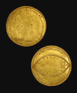 Vor- und Rückseite einer Goldmünze